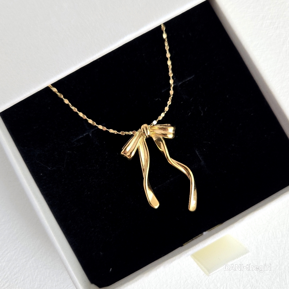 Gold Feminine Bow Necklace on Dainty Disc Chain